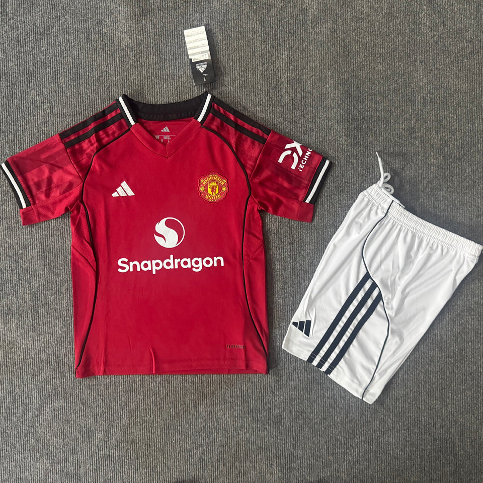 Camiseta de manga corta local del Manchester United 2025/26 para niños