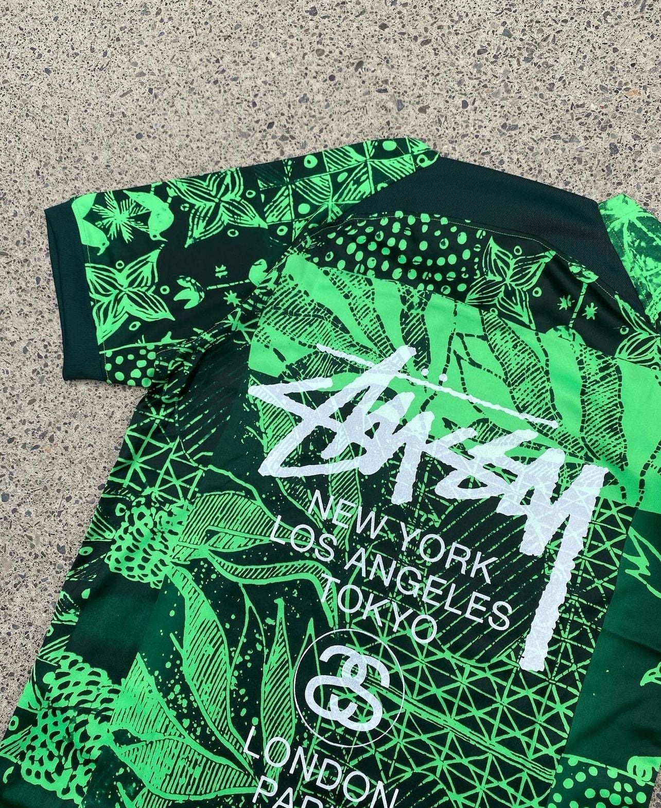 CAMISETA STUSSY X NIGERIA